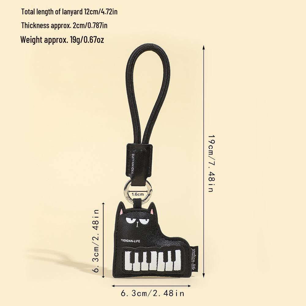 Premium Leather Musical Instrument Keychain: Cat Guitar & Piano Backpack Pendant
Premium Leather Musical Instrument Keychain: Cat Guitar & Piano Backpack Pendant