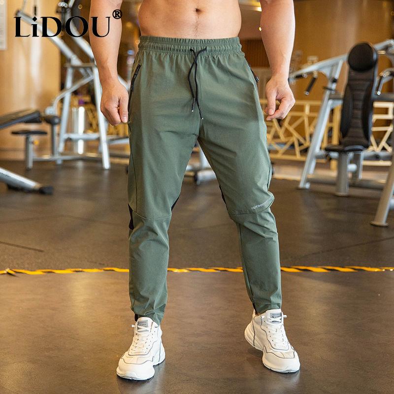 Summer Thin Style Ice Silk Fabric Motion Trousers Man Solid Color Elastic Waist Quick Drying Loose Bodybuilding Sweatpants L
Summer Thin Style Ice Silk Fabric Motion Trousers Man Solid Color Elastic Waist Quick Drying Loose Bodybuilding Sweatpants L