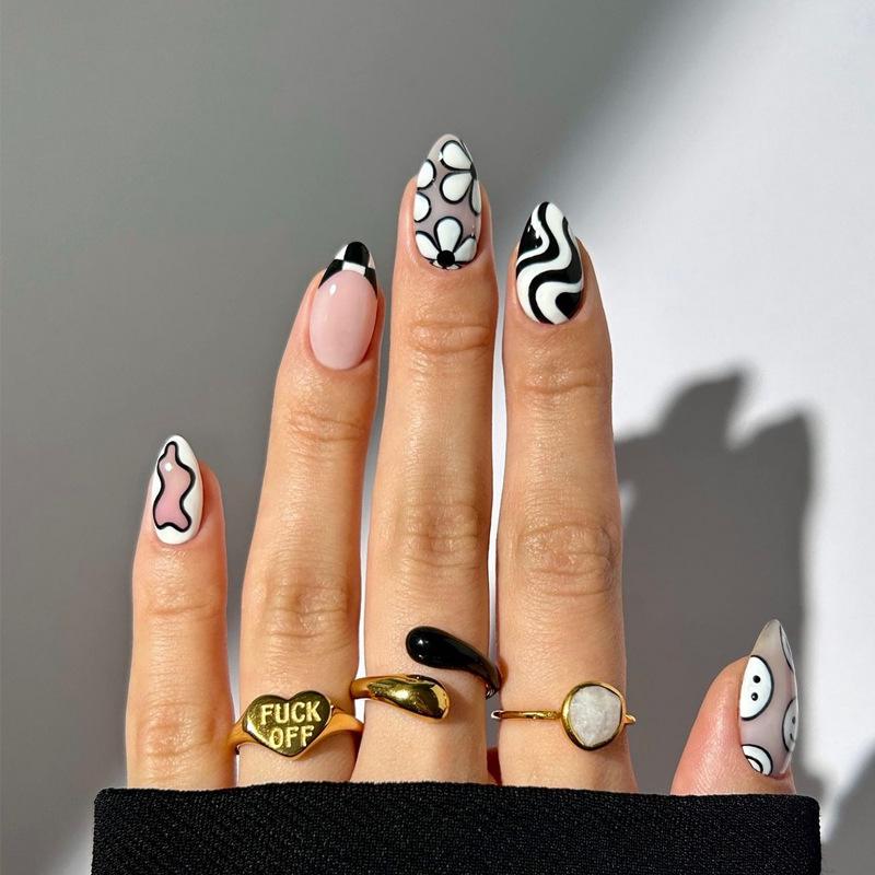 Removable Medium-Long Black & White Striped Smiley Face Flower False Nails Phototherapy Glue Set
Removable Medium-Long Black & White Striped Smiley Face Flower False Nails Phototherapy Glue Set