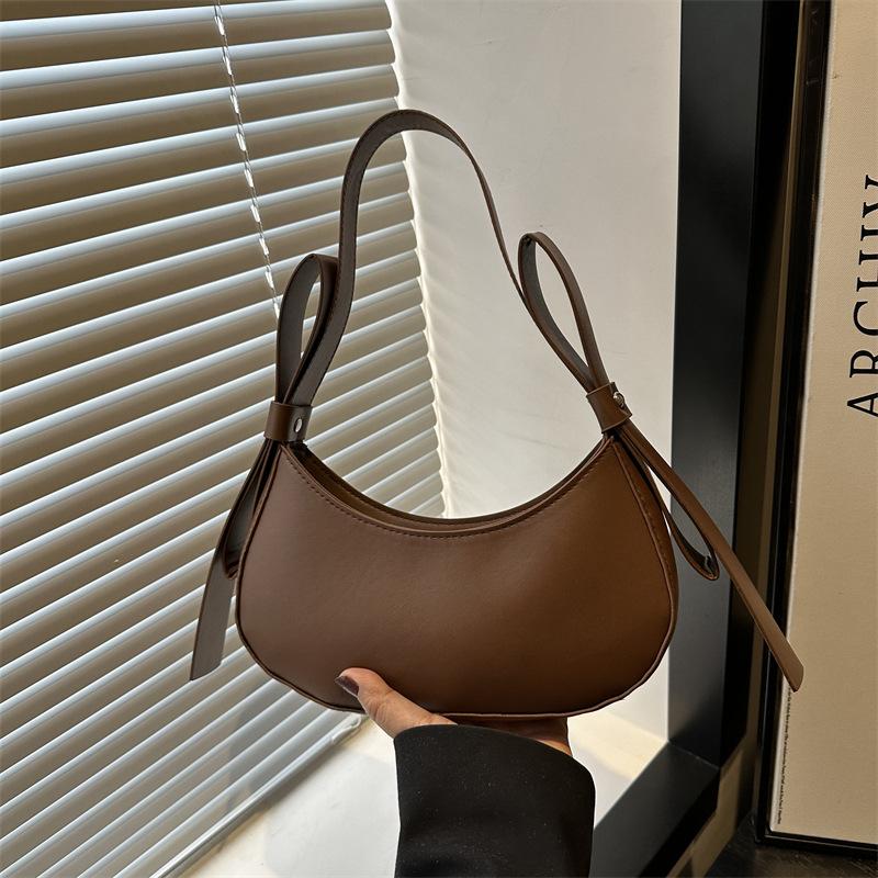 Korean version of spring new simple casual foreign trend personalized crescent bag fashion one shoulder oblique span small bag women s bag коричневий
Korean version of spring new simple casual foreign trend personalized crescent bag fashion one shoulder oblique span small bag women s bag коричневий