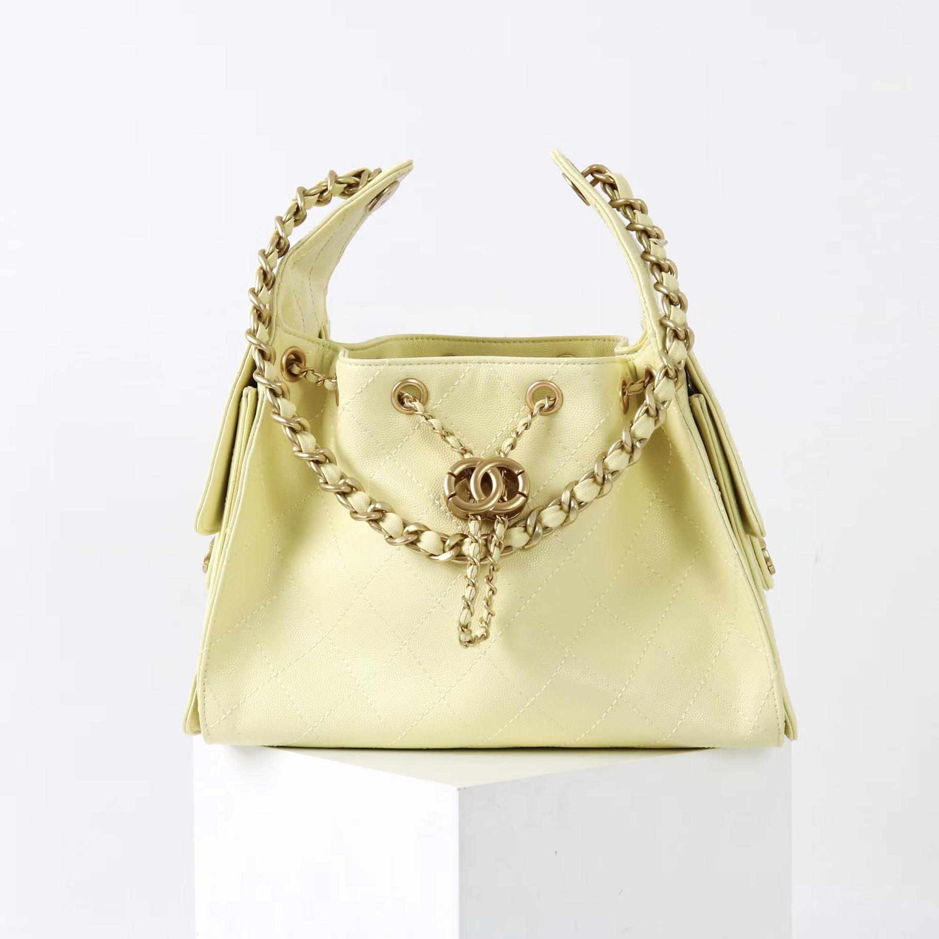 2025 New Caviar Cowhide Drawstring Bag Hobo Underarm Grid Chain Single Shoulder Hippie Bucket Premium 26cm жовтий
2025 New Caviar Cowhide Drawstring Bag Hobo Underarm Grid Chain Single Shoulder Hippie Bucket Premium 26cm жовтий