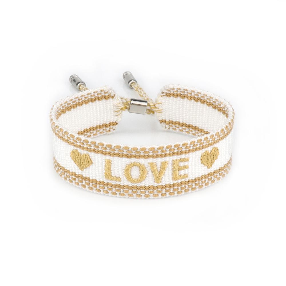 European-American Woven Women s Bracelet: Embroidered Letter, Alloy Bell, Handmade Tassel Wristband.
European-American Woven Women s Bracelet: Embroidered Letter, Alloy Bell, Handmade Tassel Wristband.