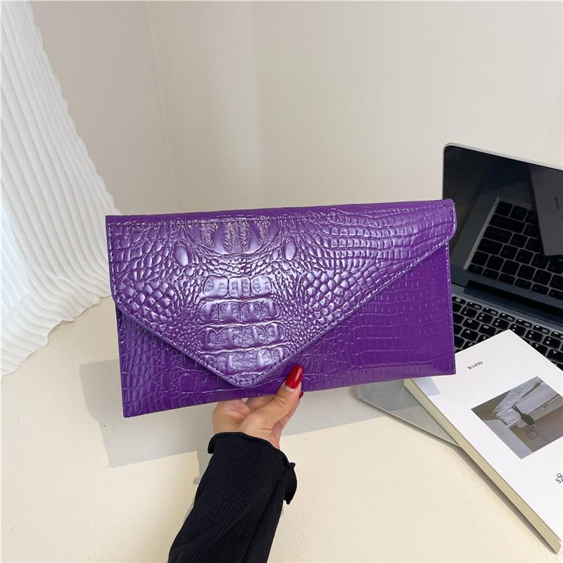Новый яркий кожаный осенний однотонный тренд, личность, большая вместимость, узор крокодила, модная ручная сумка-конверт для женщин фиолетовый
Новый яркий кожаный осенний однотонный тренд, личность, большая вместимость, узор крокодила, модная ручная сумка-конверт для женщин фиолетовый