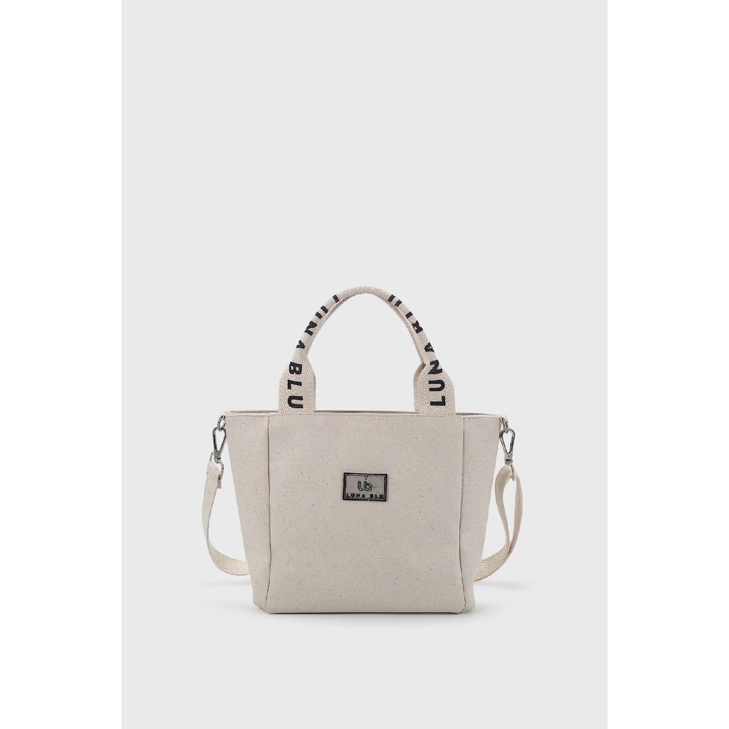 Жіноча міні-сумка з полотняної тканини
Жіноча міні-сумка з полотняної тканини