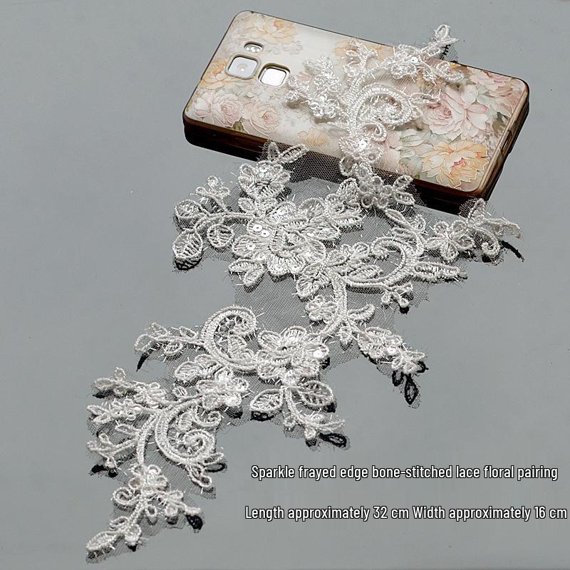 Sparkle Handmade Bridal Headdress with Raw Edge Bone Stitch Lace & Matching Floral Accessories in White
Sparkle Handmade Bridal Headdress with Raw Edge Bone Stitch Lace & Matching Floral Accessories in White