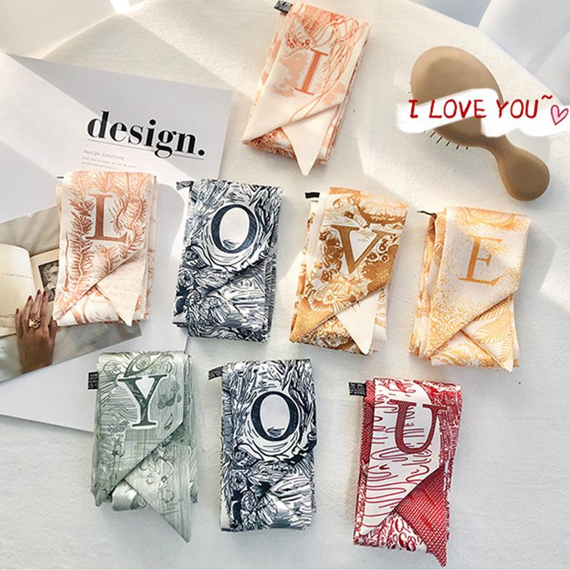 26 Letter Print Hair Ribbon Scarf Women Neck Tie Bag Scarfs Satin Skinny Headscarves Lady Ribbon Scarf Floral Bands Neckerchief
26 Letter Print Hair Ribbon Scarf Women Neck Tie Bag Scarfs Satin Skinny Headscarves Lady Ribbon Scarf Floral Bands Neckerchief