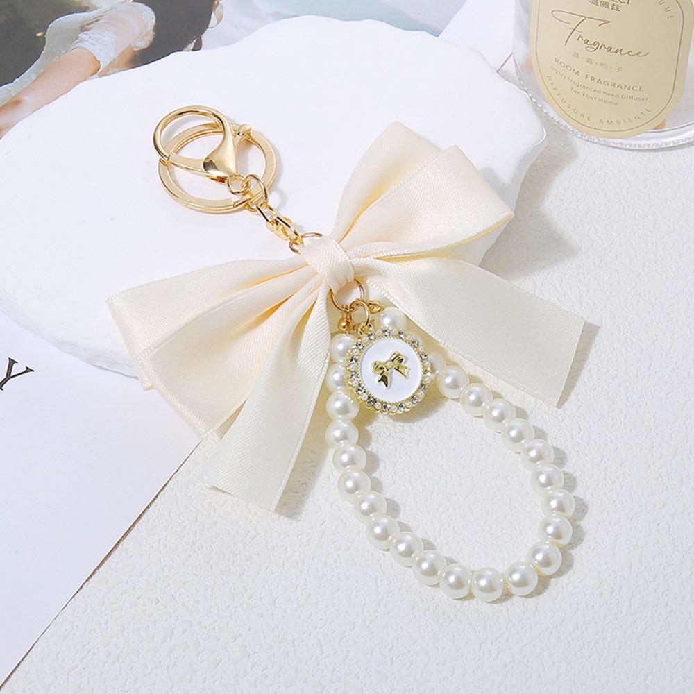 Large Bowknot Bowknot Key Chain Multi-color Pearl Bow Hanging Ornament Heart Shape White Bowknot Charm Keychain Gift Giving бежевый
Large Bowknot Bowknot Key Chain Multi-color Pearl Bow Hanging Ornament Heart Shape White Bowknot Charm Keychain Gift Giving бежевый