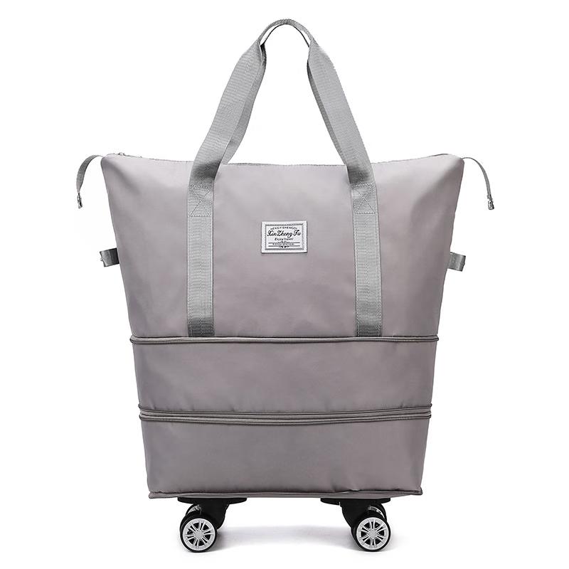 Li Shen Oxford Expandable Travel Handbag with Universal Wheels 23-32L
Li Shen Oxford Expandable Travel Handbag with Universal Wheels 23-32L