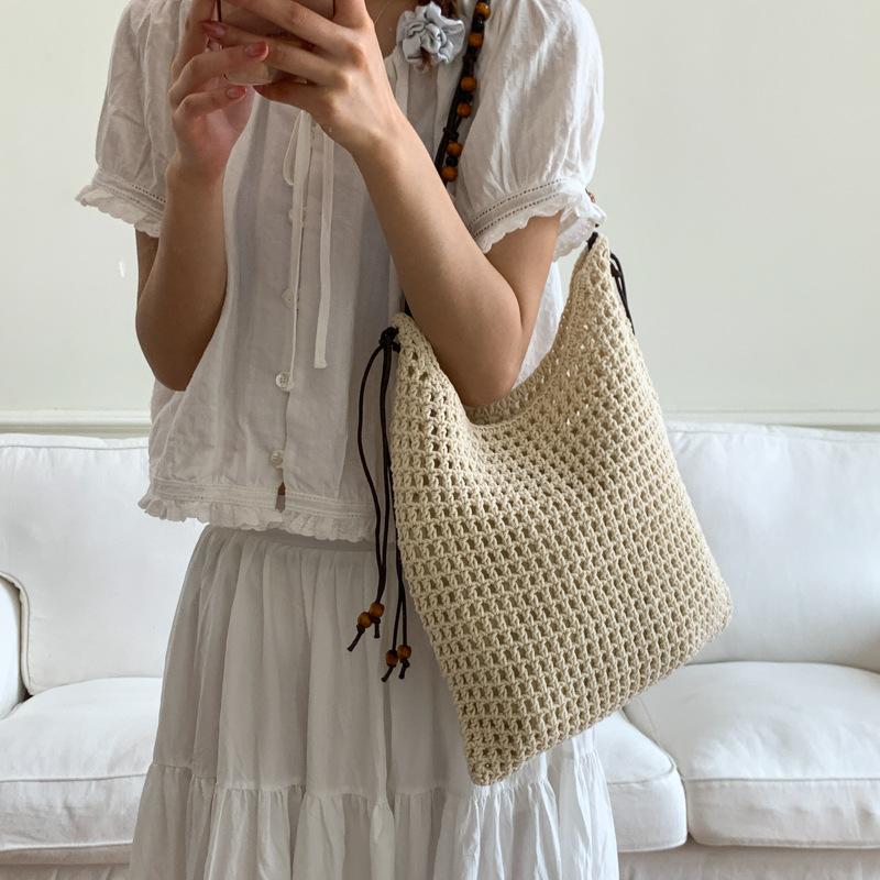 Niche design mesh bag hollow woven tote bag shoulder messenger bag new casual style beach bag
Niche design mesh bag hollow woven tote bag shoulder messenger bag new casual style beach bag