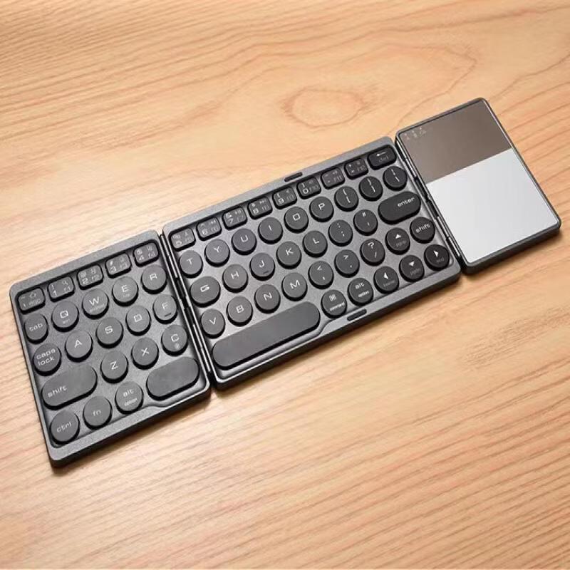 OLOEY Three-Fold Folding Bluetooth Keyboard
OLOEY Three-Fold Folding Bluetooth Keyboard