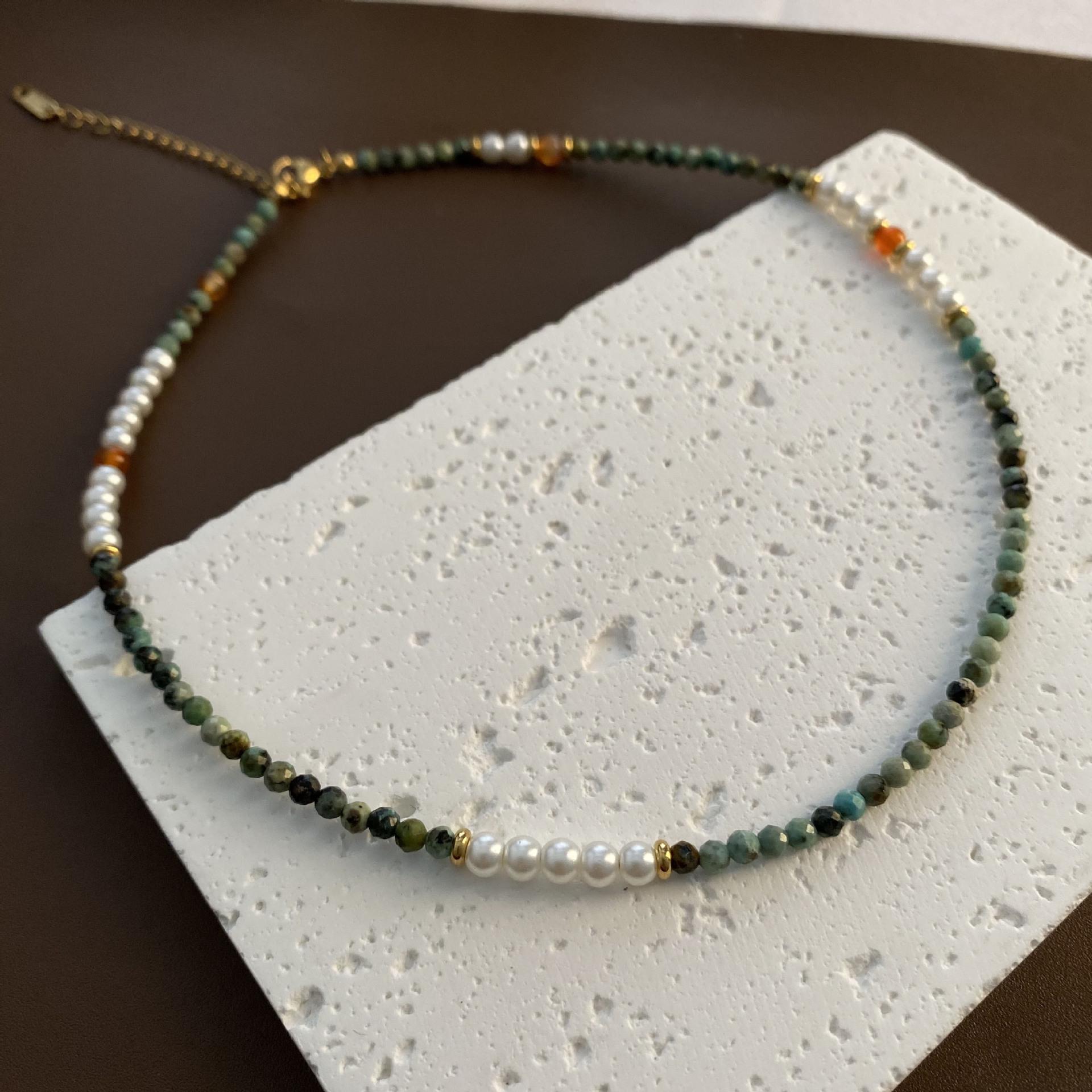 Набор ручной работы из титановой стали и жемчужных бус: ожерелье и браслет-чокер
Набор ручной работы из титановой стали и жемчужных бус: ожерелье и браслет-чокер