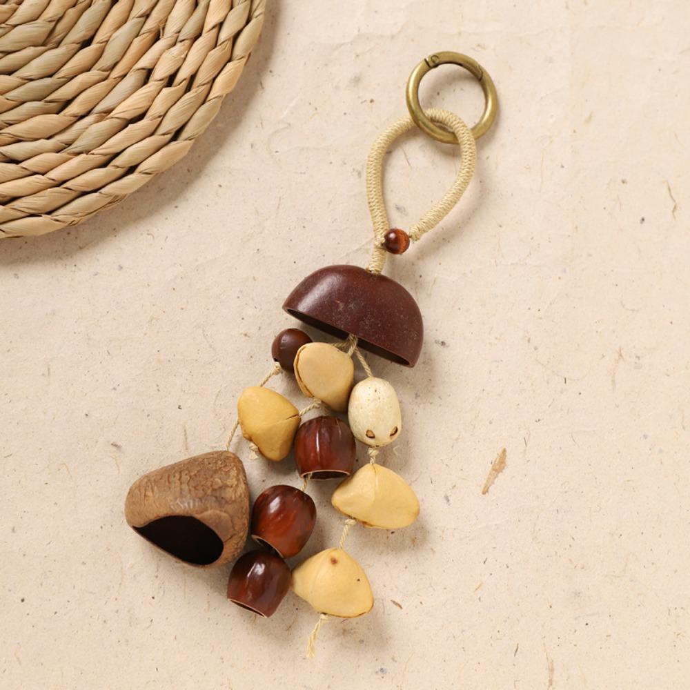 Sound Heal Natural Fruit Shell Keychain Bohemian Style DIY Hand-Cranked Wind Chime Gift Handmade Fruit Shell Wind Chime Ornament
Sound Heal Natural Fruit Shell Keychain Bohemian Style DIY Hand-Cranked Wind Chime Gift Handmade Fruit Shell Wind Chime Ornament