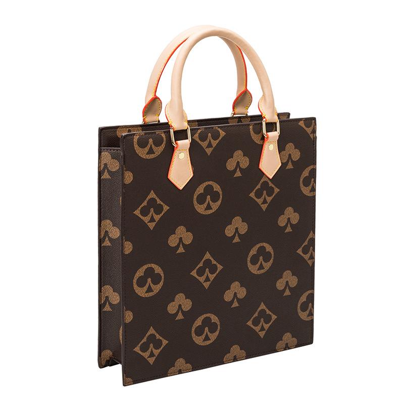 New trendy portable women s bag large-capacity work business briefcase simple vertical file computer bag темно-коричневого
New trendy portable women s bag large-capacity work business briefcase simple vertical file computer bag темно-коричневого