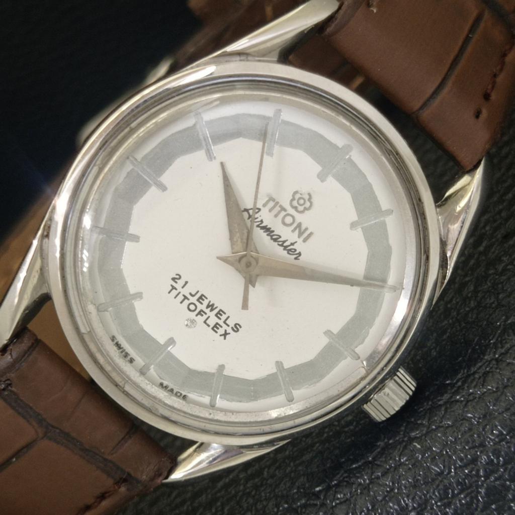 VINTAGE TITONI AIRMASTER TITOFLEX HAND-WINDING SWISS MENS WHITE WATCH a703210-1 R213a-a703210
VINTAGE TITONI AIRMASTER TITOFLEX HAND-WINDING SWISS MENS WHITE WATCH a703210-1 R213a-a703210