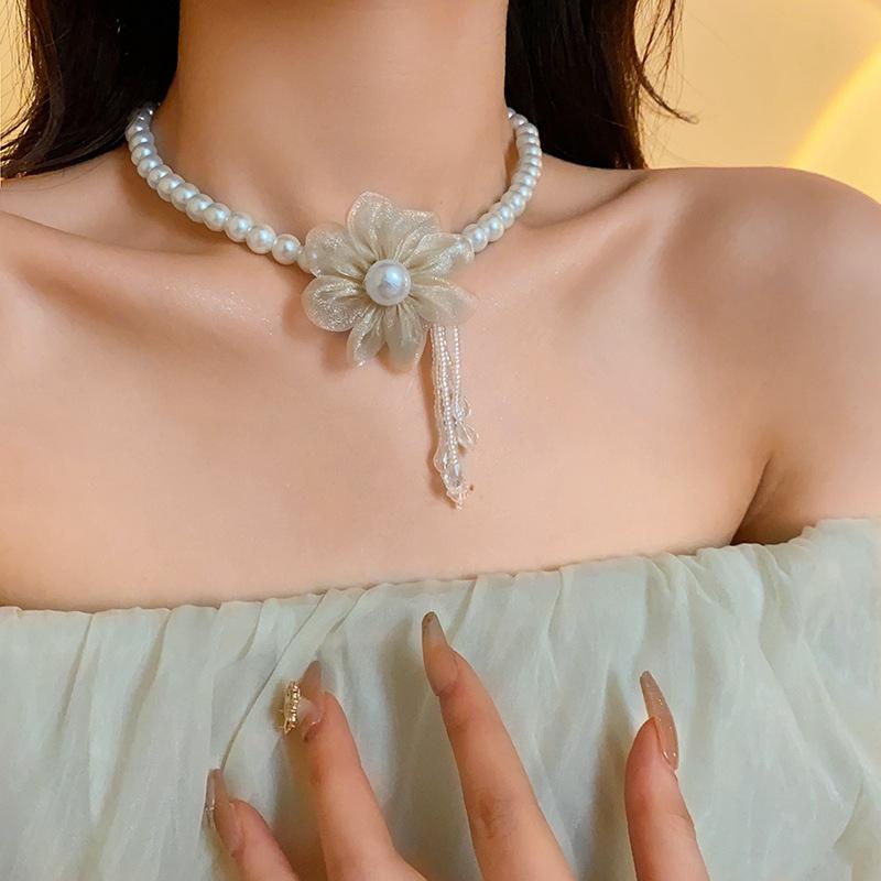 Pearl mesh yarn flower crystal fringed necklace, a multi-wearing collarbone chain light luxury jewelry women s high sense
Pearl mesh yarn flower crystal fringed necklace, a multi-wearing collarbone chain light luxury jewelry women s high sense