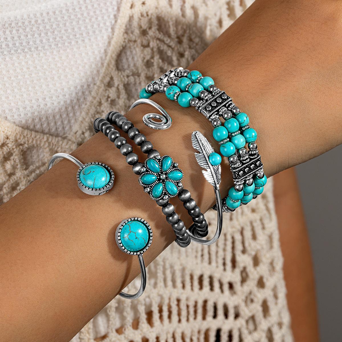 4-piece vintage turquoise round buckle elastic string bead bracelet with multiple layers of Navojo bead flower bracelet set
4-piece vintage turquoise round buckle elastic string bead bracelet with multiple layers of Navojo bead flower bracelet set