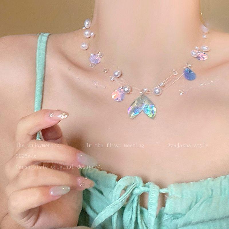 Pearl shell sequined fishtail pendant necklace vacation style versatile collarbone chain niche fashion temperament jewelry
Pearl shell sequined fishtail pendant necklace vacation style versatile collarbone chain niche fashion temperament jewelry
