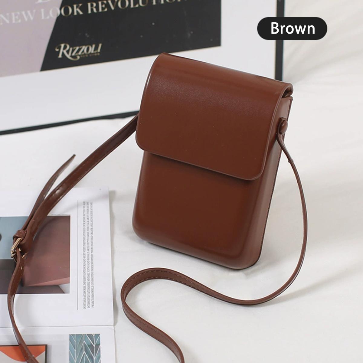 Versatile vertical Japanese and Korean simple flip phe bag, commuting PU leather crossbody bag, square single-shoulder bag коричневий
Versatile vertical Japanese and Korean simple flip phe bag, commuting PU leather crossbody bag, square single-shoulder bag коричневий