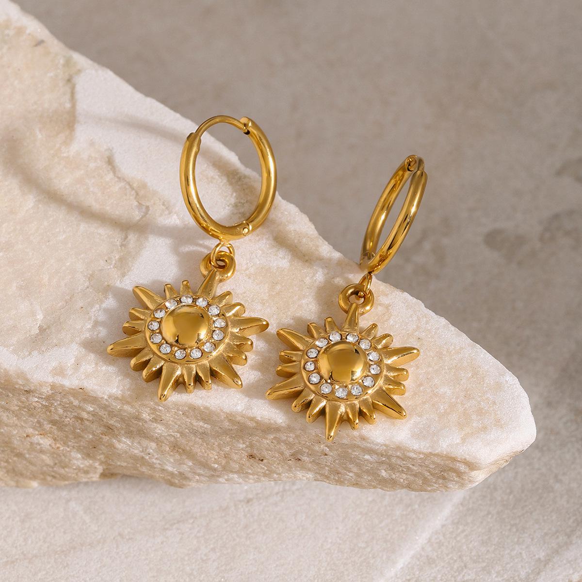 18K Gold Stainless Steel Sun Pendant Earrings with Rhinestones - Women s European & American Niche Fashion Titanium Steel Set.
18K Gold Stainless Steel Sun Pendant Earrings with Rhinestones - Women s European & American Niche Fashion Titanium Steel Set.