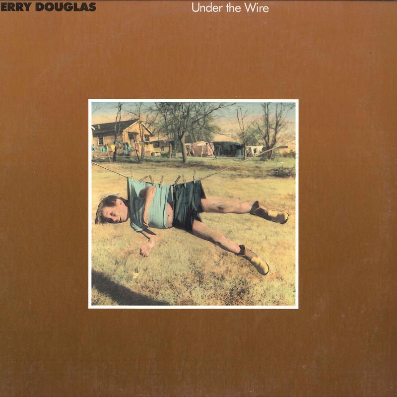 LP Record JERRY DOUGLAS - Under The Wire MCA5675 MCA 1986 US Country/Folk Used
LP Record JERRY DOUGLAS - Under The Wire MCA5675 MCA 1986 US Country/Folk Used