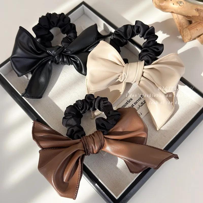 Elegant Maillard Color PU Leather Big Bowknot Hair Ties Scrunchie for Women Ponytail Holder Hair Accessories Korean Headband New
Elegant Maillard Color PU Leather Big Bowknot Hair Ties Scrunchie for Women Ponytail Holder Hair Accessories Korean Headband New