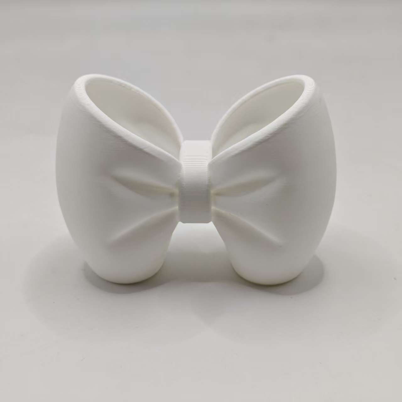 Bowknot Design Toothbrush Holder Multifunctional Desktop Pen Holder Bathroom Storage Rack White
Bowknot Design Toothbrush Holder Multifunctional Desktop Pen Holder Bathroom Storage Rack White