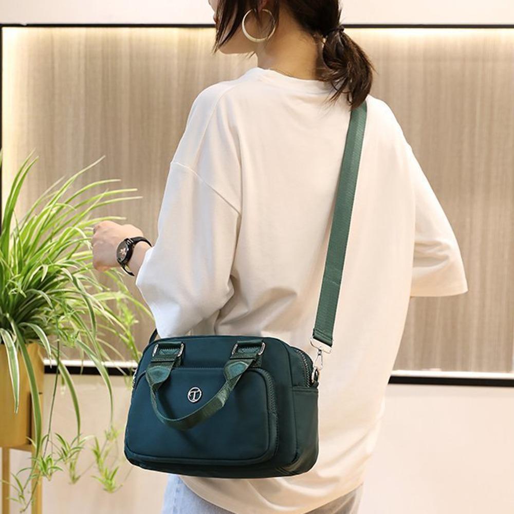Multi Pockets Nylon Crossbody Bag Waterproof Women Handbag Trendy Square Shoulder Bag Female темно-синього кольору
Multi Pockets Nylon Crossbody Bag Waterproof Women Handbag Trendy Square Shoulder Bag Female темно-синього кольору