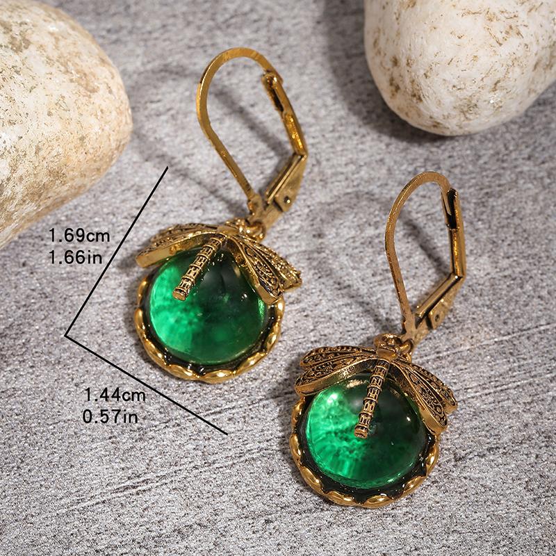 Винтажные бронзовые серьги-стрекозы Модные серьги-капли из металла золотистого цвета с резным узором, инкрустированные разноцветным лунным камнем для женщин
Винтажные бронзовые серьги-стрекозы Модные серьги-капли из металла золотистого цвета с резным узором, инкрустированные разноцветным лунным камнем для женщин