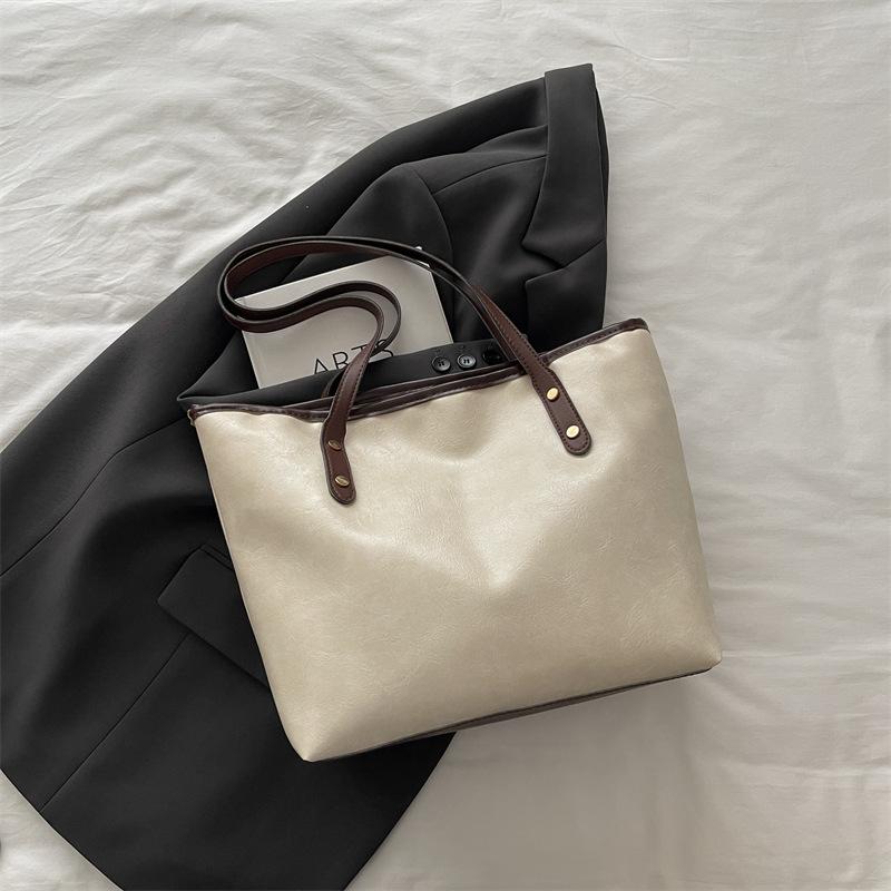 Осень новая модная универсальная одноплечевая рабочая повседневная нишевая сумка-тоут для通勤 для женщин
Осень новая модная универсальная одноплечевая рабочая повседневная нишевая сумка-тоут для通勤 для женщин