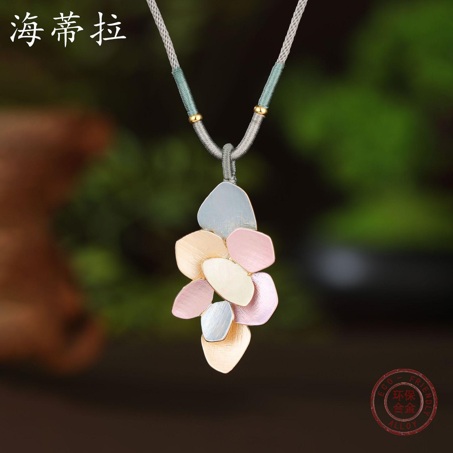 New color painting oil geometric petal braided rope long pendant, women s personality versatile flower long necklace
New color painting oil geometric petal braided rope long pendant, women s personality versatile flower long necklace