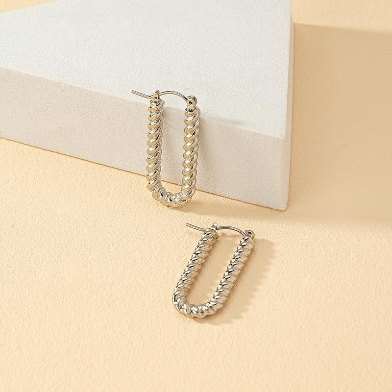 Geometric Spiral Earrings: Minimalist European & American Style for Women, Trendy Cold Fashion
Geometric Spiral Earrings: Minimalist European & American Style for Women, Trendy Cold Fashion