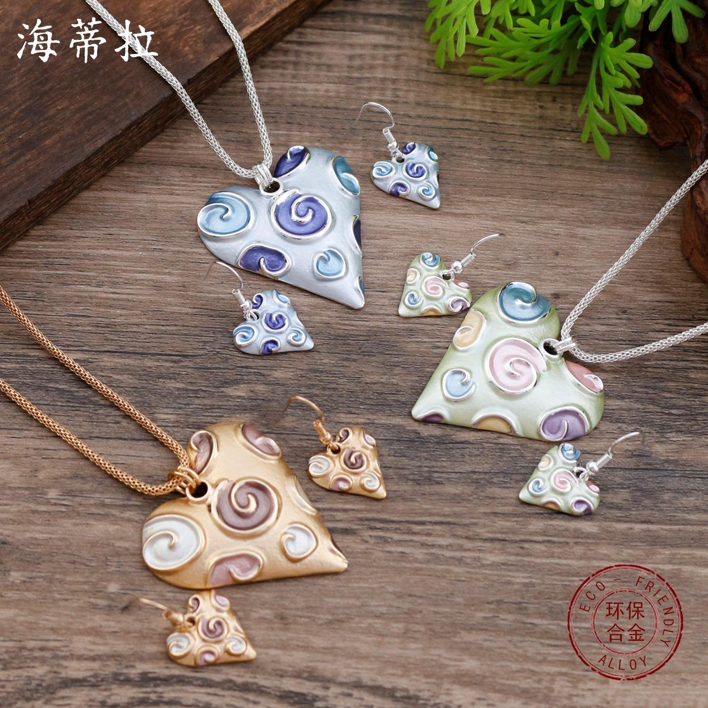 New enamel love earrings pendant set, women s simple and high-end heart-shaped vortex necklace.
New enamel love earrings pendant set, women s simple and high-end heart-shaped vortex necklace.