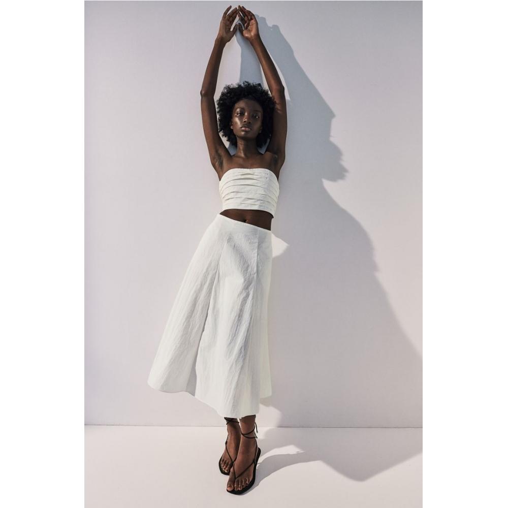 HM Нейлоновый укороченный топ без бретелек Белый
HM Нейлоновый укороченный топ без бретелек Белый