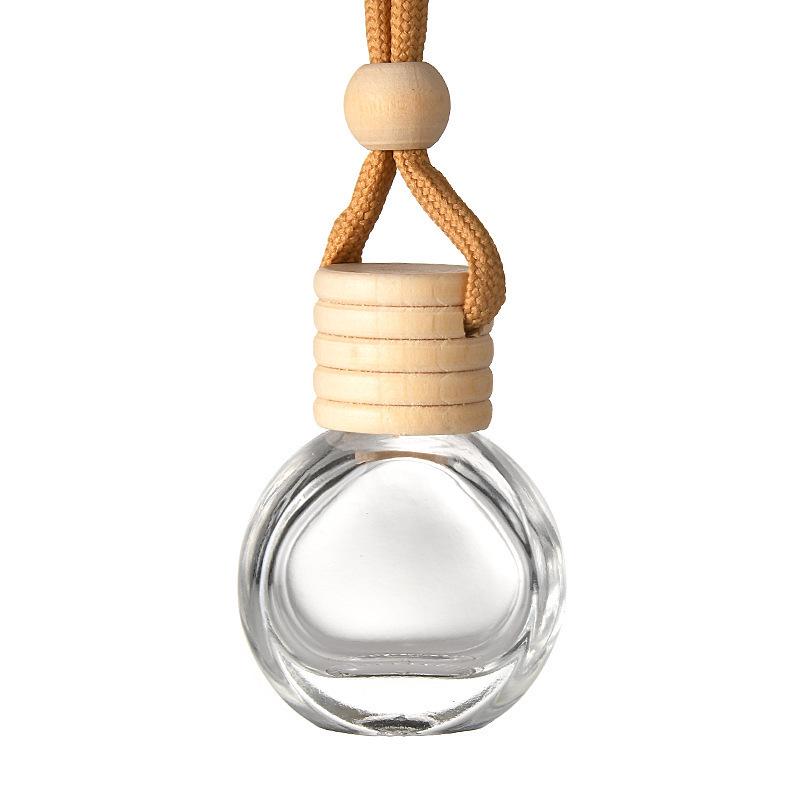 Creative Car Perfume Bottle with Wooden Cap and Lanyard – Empty Glass Fragrance Ornament.
Creative Car Perfume Bottle with Wooden Cap and Lanyard – Empty Glass Fragrance Ornament.
