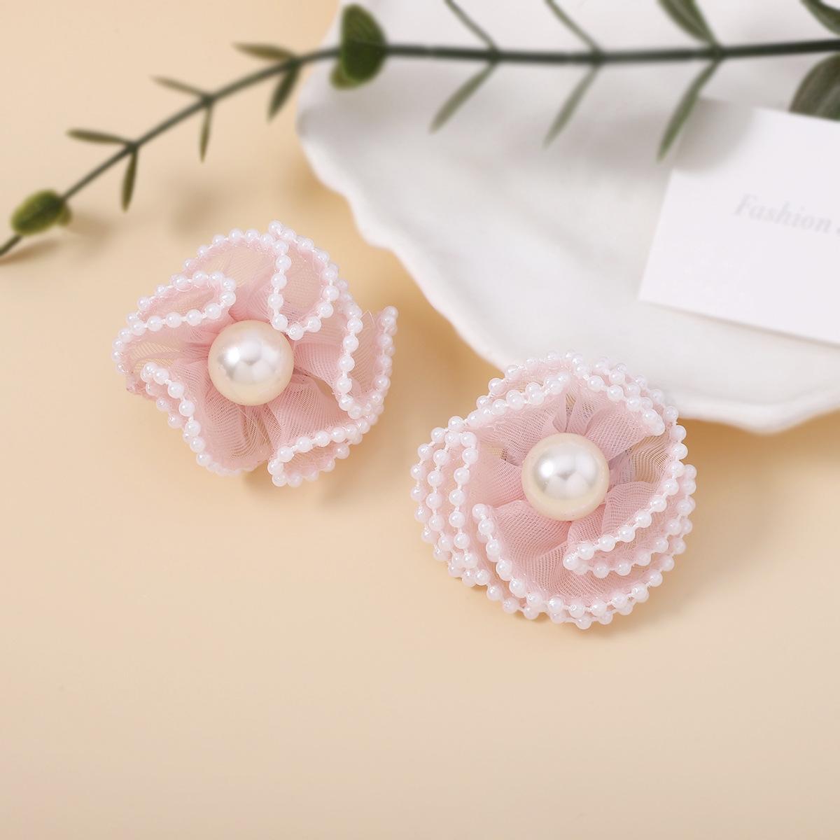 Korean version spring pearl edge three-dimensional chiffon camellia earrings Fairy Princess Little Fragrance style fabric design earrings
Korean version spring pearl edge three-dimensional chiffon camellia earrings Fairy Princess Little Fragrance style fabric design earrings
