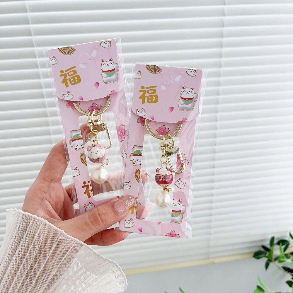 Мультяшный кулон Maneki Neko в японском стиле, автомобильный брелок, керамический брелок для кошек, аксессуары жёлтый
Мультяшный кулон Maneki Neko в японском стиле, автомобильный брелок, керамический брелок для кошек, аксессуары жёлтый