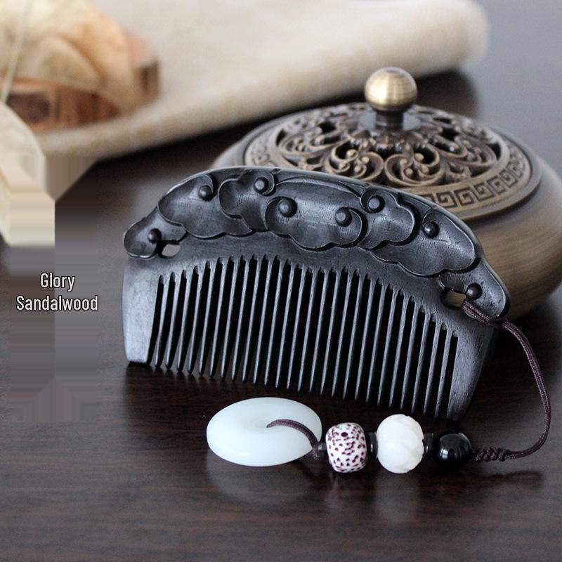Purple Sandalwood Double-Sided Pocket Comb with Auspicious Clouds Carving, Anti-Static Massage.
Purple Sandalwood Double-Sided Pocket Comb with Auspicious Clouds Carving, Anti-Static Massage.