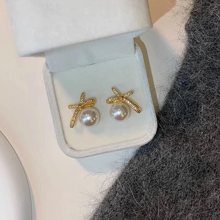 Bow imitation pearl earrings niche unique temperament versatile light luxury high-end stud earrings new explosion
Bow imitation pearl earrings niche unique temperament versatile light luxury high-end stud earrings new explosion