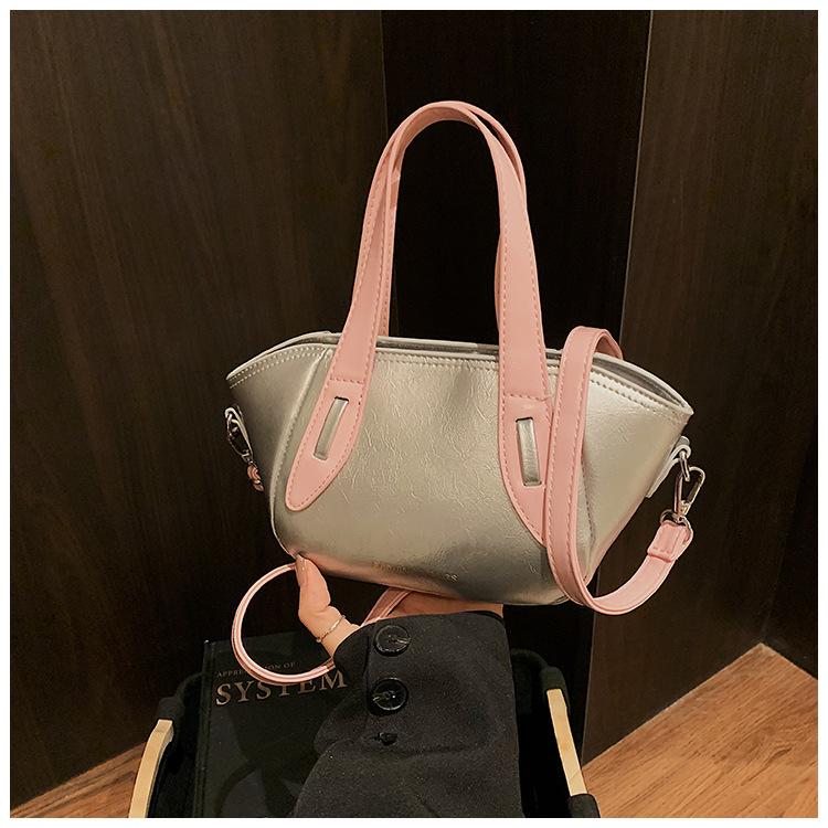 Niche bag women s new fashion high-end sense versatile messenger bucket bag commuter small bag срібний
Niche bag women s new fashion high-end sense versatile messenger bucket bag commuter small bag срібний