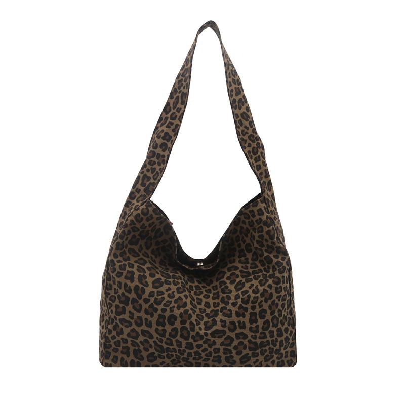 Leopard Pattern Tote Bag Vintage Wide Strap Bucket Large Capacity Crossbody Bags for Commute Outings Female Underarm Purse Bag
Leopard Pattern Tote Bag Vintage Wide Strap Bucket Large Capacity Crossbody Bags for Commute Outings Female Underarm Purse Bag