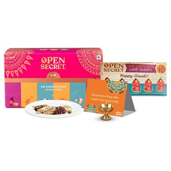 Open Secret Gift Hamper Item Snacks Combo Box | 3 Item Gift Combo - Assorted Cookies + Card + Decorative Lights | Healthy Unjunked Food
Open Secret Gift Hamper Item Snacks Combo Box | 3 Item Gift Combo - Assorted Cookies + Card + Decorative Lights | Healthy Unjunked Food