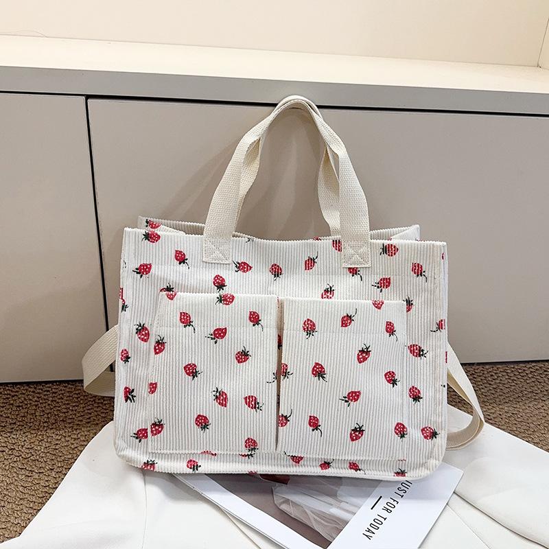 Sweet Bowknot Strawberry Canvas Tote Bag Women Simple Large Capacity Shoulder Bag School Work Commute Bag
Sweet Bowknot Strawberry Canvas Tote Bag Women Simple Large Capacity Shoulder Bag School Work Commute Bag