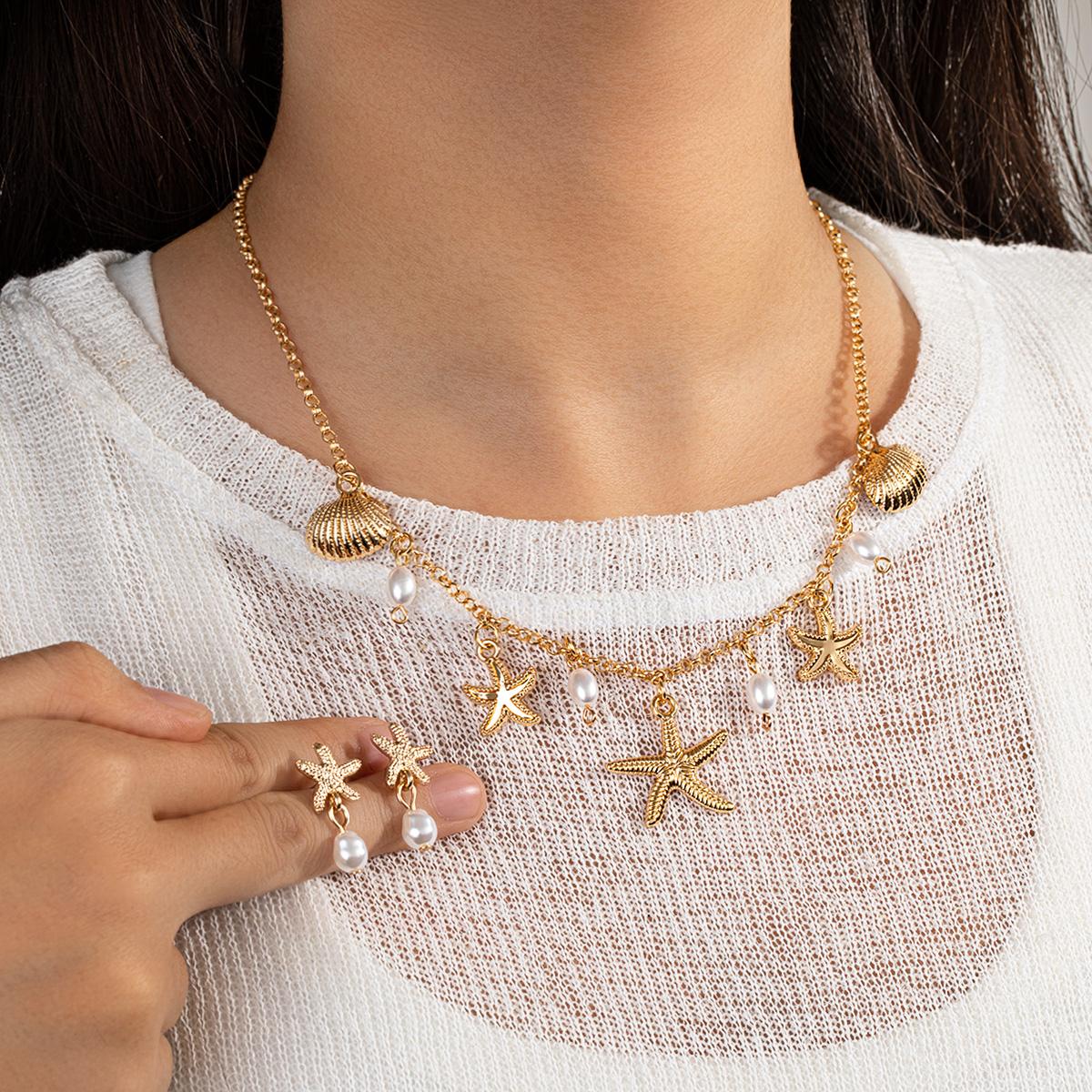 2-Piece Resort Beach Metal Star Pendant Necklace & Pearl-Ear Ring Set - Versatile Women s Jewelry Set
2-Piece Resort Beach Metal Star Pendant Necklace & Pearl-Ear Ring Set - Versatile Women s Jewelry Set