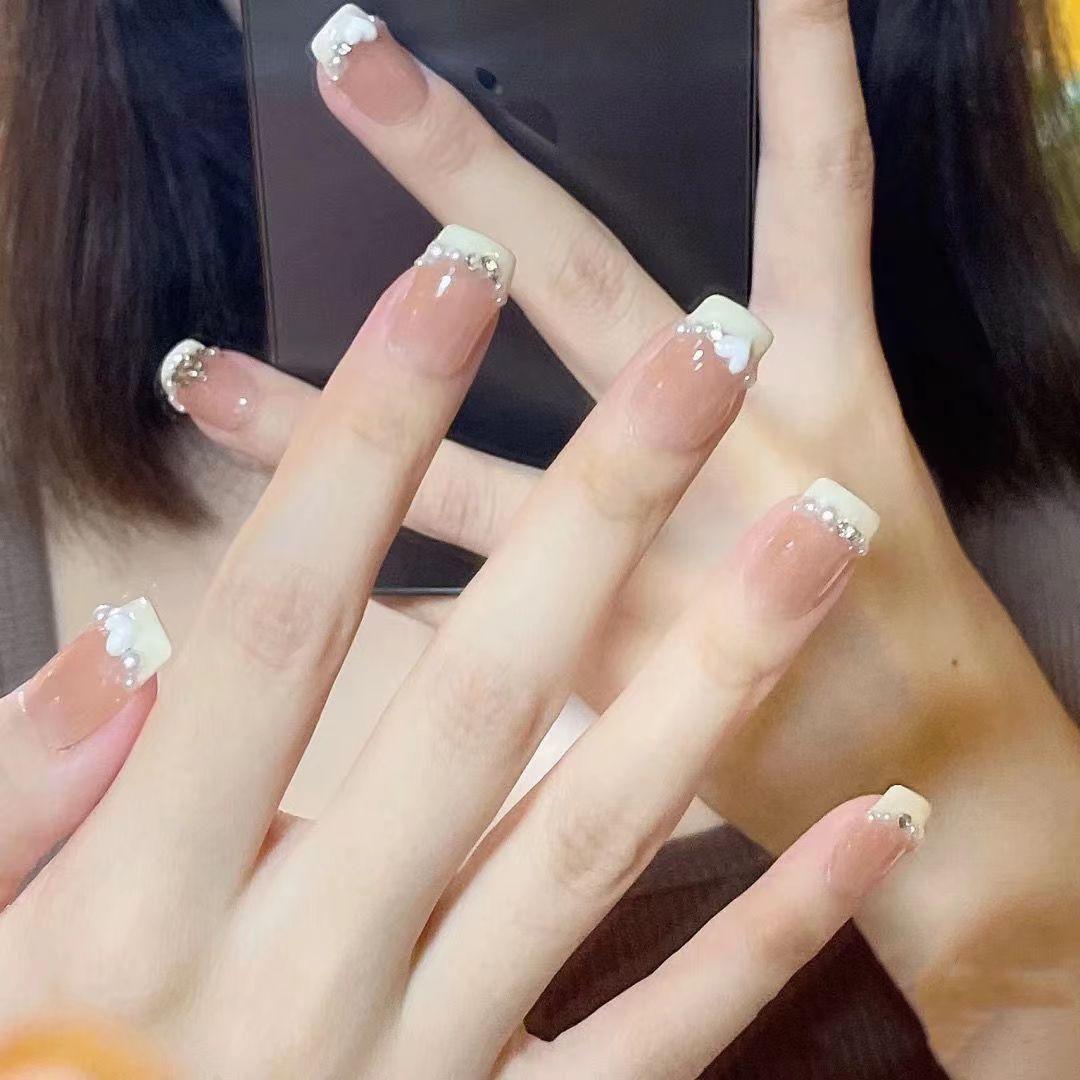 10 шт./набор ручной работы французский светотерапевтический маникюр Love Puff носимые съемные накладные наклейки для ногтей M Medium
10 шт./набор ручной работы французский светотерапевтический маникюр Love Puff носимые съемные накладные наклейки для ногтей M Medium