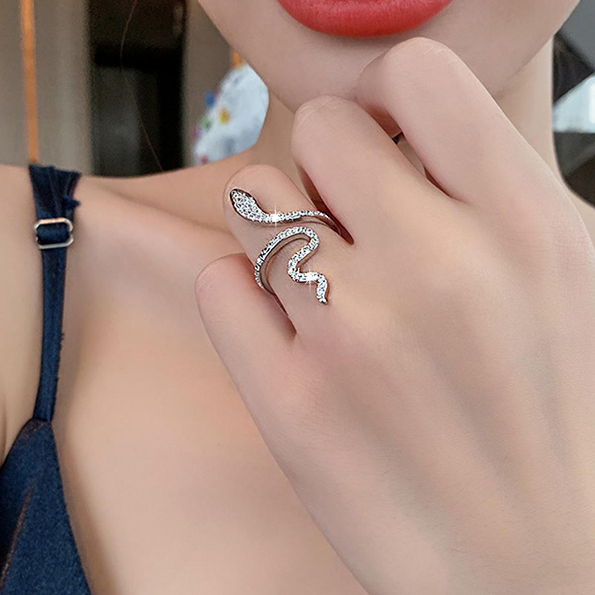 European & American Style Adjustable Copper Ring with Micro-Inlaid Sparkling Zircon and Serpent Design
European & American Style Adjustable Copper Ring with Micro-Inlaid Sparkling Zircon and Serpent Design