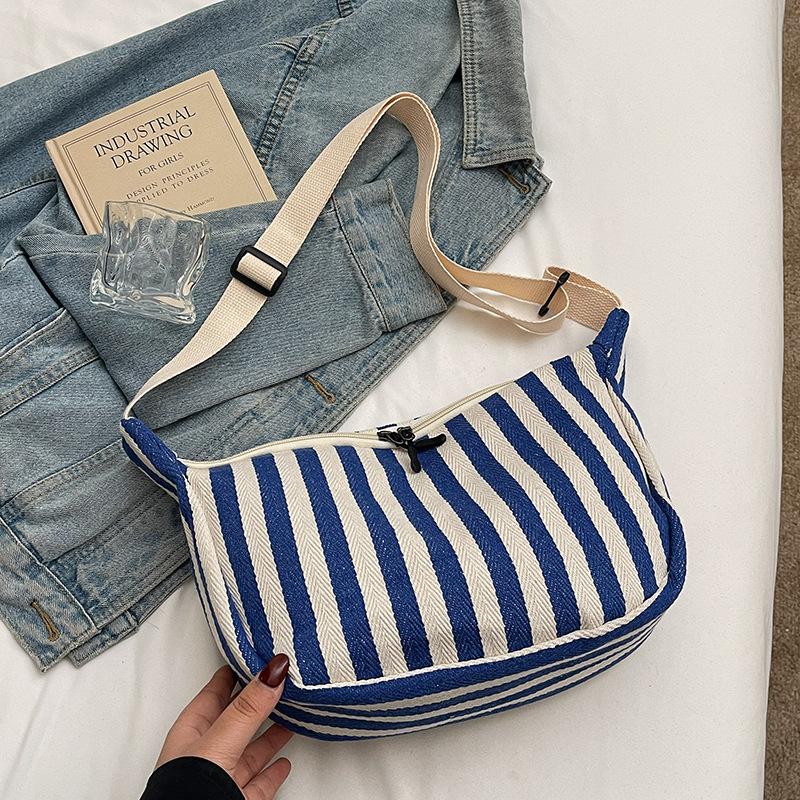 Korean version of retro literary striped canvas bag women 2025 simple small fresh casual fashion large capacity shoulder bag women светло-синий
Korean version of retro literary striped canvas bag women 2025 simple small fresh casual fashion large capacity shoulder bag women светло-синий