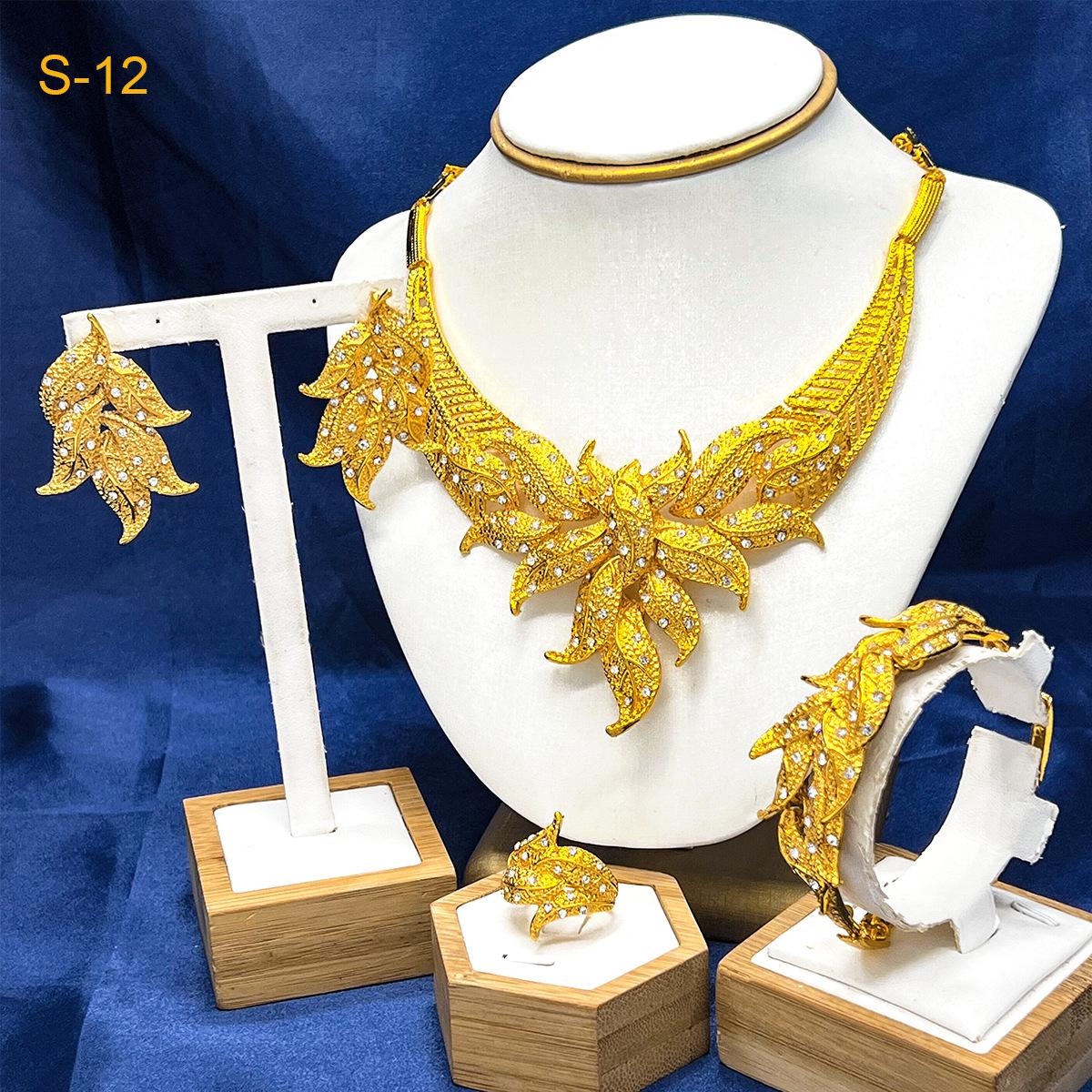 2026 Middle East Gold Wedding Jewelry Set Indian Bridal Necklace Ring Earrings Bracelet Four-piece Set 45cm
2026 Middle East Gold Wedding Jewelry Set Indian Bridal Necklace Ring Earrings Bracelet Four-piece Set 45cm