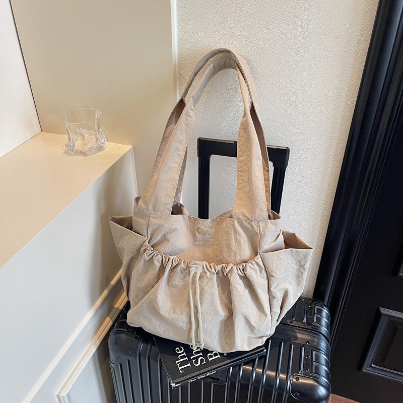 Летняя новая большая вместительная однотонная повседневная сумка-тоут модная тканевая сумка сумка через плечо для поездок на работу женская сумка хаки
Летняя новая большая вместительная однотонная повседневная сумка-тоут модная тканевая сумка сумка через плечо для поездок на работу женская сумка хаки