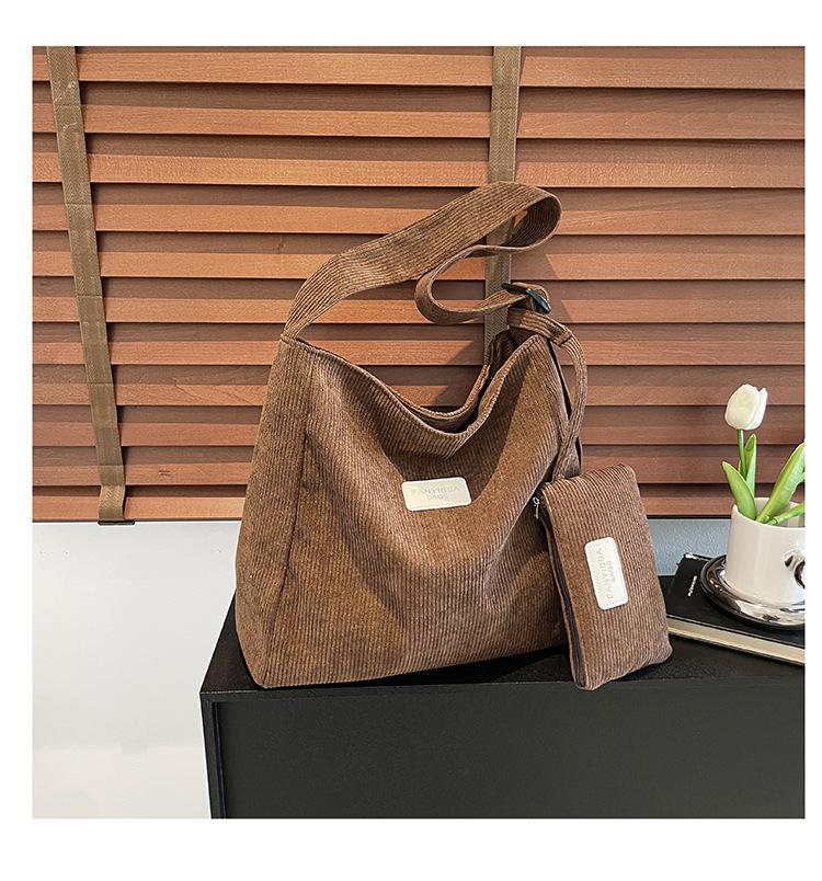 Вельветовый большой вместимости новый летний комплект из двух частей повседневная детская и материнская сумка-тоут на плечо, сумка-мессенджер, сумка женская коричневый
Вельветовый большой вместимости новый летний комплект из двух частей повседневная детская и материнская сумка-тоут на плечо, сумка-мессенджер, сумка женская коричневый