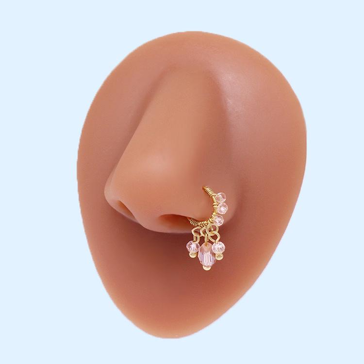 Европейский и американский пирсинг носа из неправильной формы дробленого камня с разноцветными глазами и подвеской в виде пятиконечной звезды
Европейский и американский пирсинг носа из неправильной формы дробленого камня с разноцветными глазами и подвеской в виде пятиконечной звезды